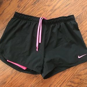Nike black and pink running shorts